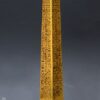 obelisco dorado