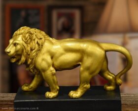 Figura de león dorado. 26x14cm