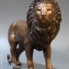 bronce león