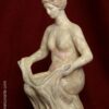 figura decorativa tanagra Venus cuclillas